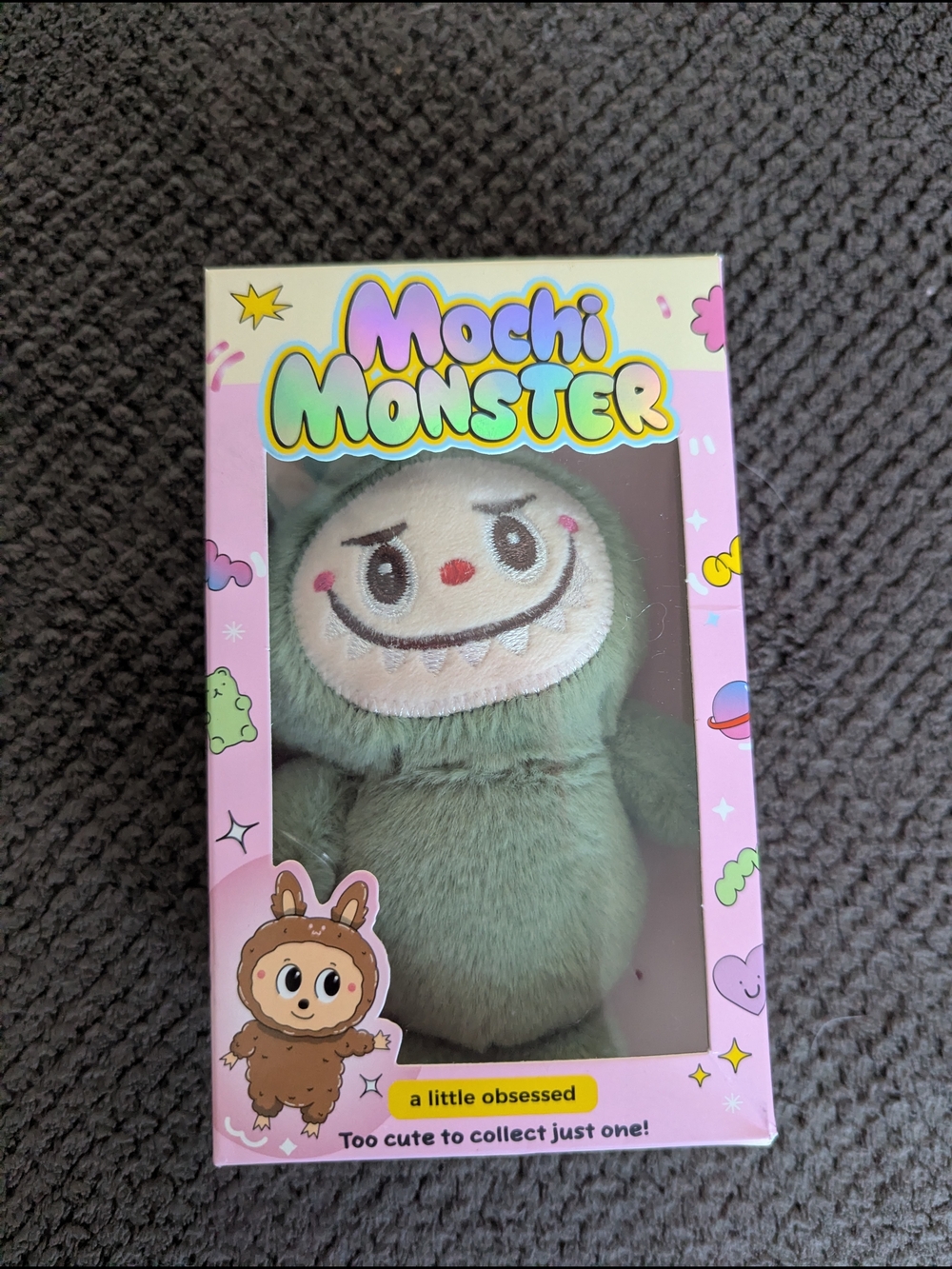 Like new, Mochi Monster collectible key chain.  a little obsessed plush monster